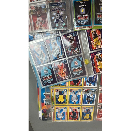 21 - A large collection of assorted football cards in seven folders mainly Match Attax with chrome cards.... 