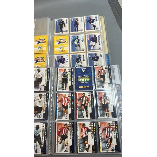 22 - A large collection of assorted football cards in four folders mainly Topps Shoot Out. Viewing recomm... 