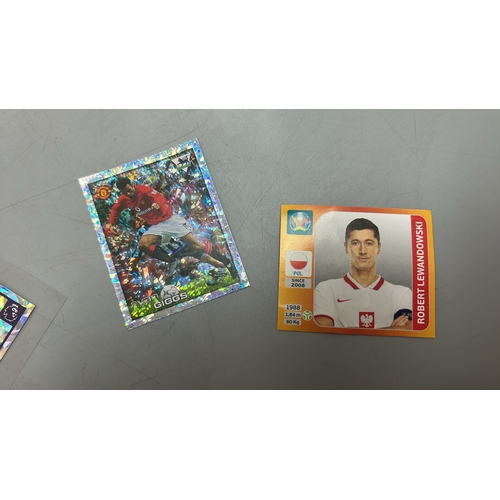 28 - Assorted Football stickers and cards including Panini and  Topps /AN19