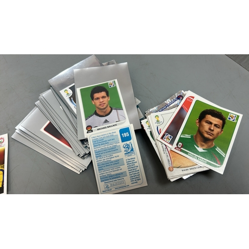 28 - Assorted Football stickers and cards including Panini and  Topps /AN19