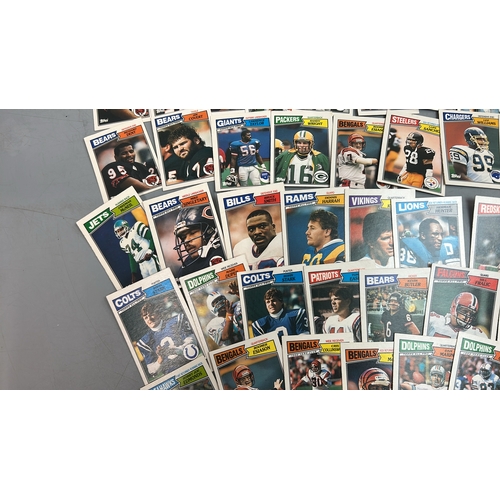 46 - American Football Trading Cards - A Collection of over sixty Topps cards from 1987 with some duplica... 