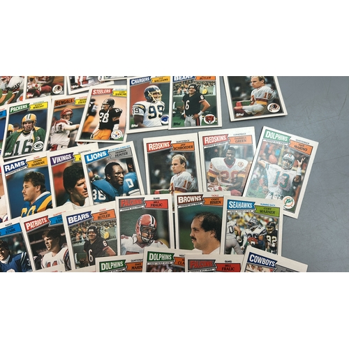 46 - American Football Trading Cards - A Collection of over sixty Topps cards from 1987 with some duplica... 