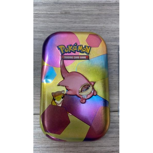 5230 - RRP: 8.505 - POKEMON MINI TIN BUNDLE - 50 ASSORTED CARDS, 1 RANDOM ULTRA RARE & GAME COIN / SEE IMAG... 