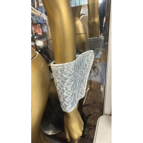11 - Five cosmic 'Barbarella' style costumes with gauntlets. Rail 1