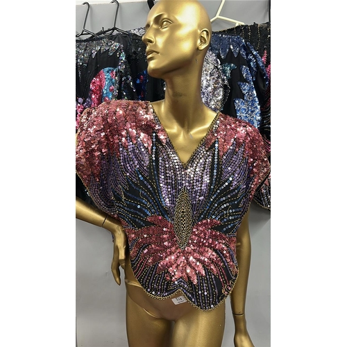 26 - An assortment of Vintage sequinned butterfly and peacock tops of varying colour combinations, 17 top... 
