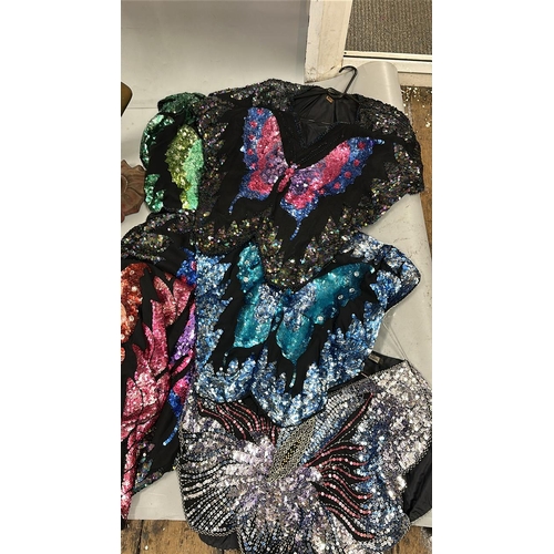 26 - An assortment of Vintage sequinned butterfly and peacock tops of varying colour combinations, 17 top... 