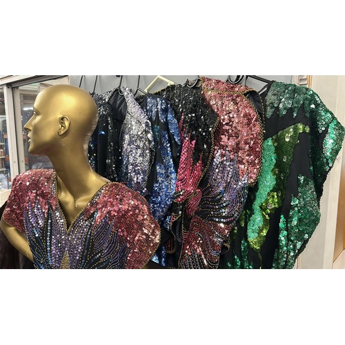 26 - An assortment of Vintage sequinned butterfly and peacock tops of varying colour combinations, 17 top... 
