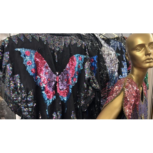 26 - An assortment of Vintage sequinned butterfly and peacock tops of varying colour combinations, 17 top... 