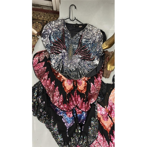 26 - An assortment of Vintage sequinned butterfly and peacock tops of varying colour combinations, 17 top... 