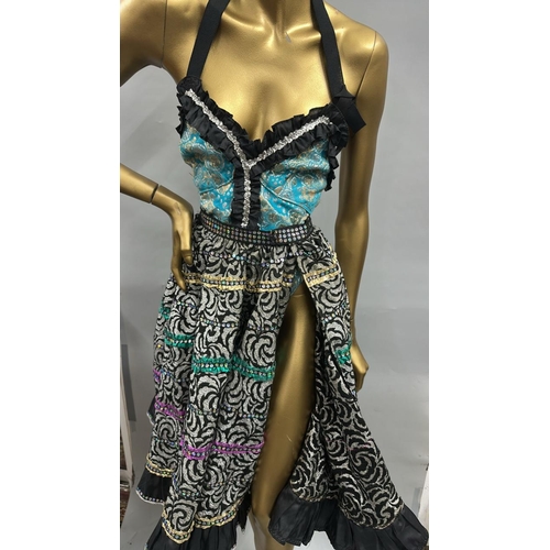 37 - Assorted Can-Can dancer costumes comprising seven bodysuits and four skirts / Rail 3