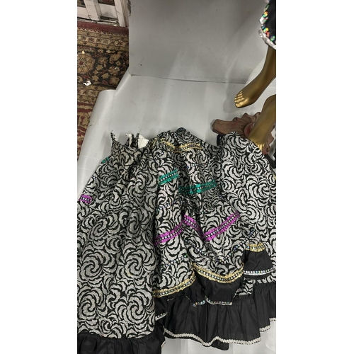 37 - Assorted Can-Can dancer costumes comprising seven bodysuits and four skirts / Rail 3