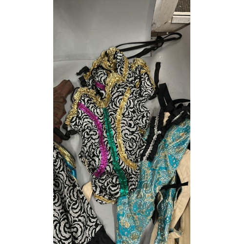 37 - Assorted Can-Can dancer costumes comprising seven bodysuits and four skirts / Rail 3