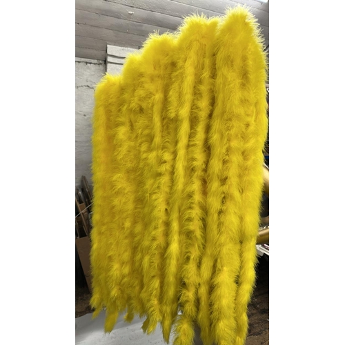 76 - Ten stage used showgirl yellow / yellow & green feather back pieces / Rail 4
