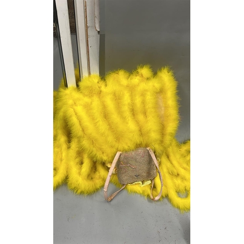 76 - Ten stage used showgirl yellow / yellow & green feather back pieces / Rail 4