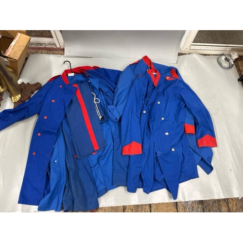 87 - A collection of 'stage worn' military style circus costume 3/4 length jackets, jackets, trousers and... 