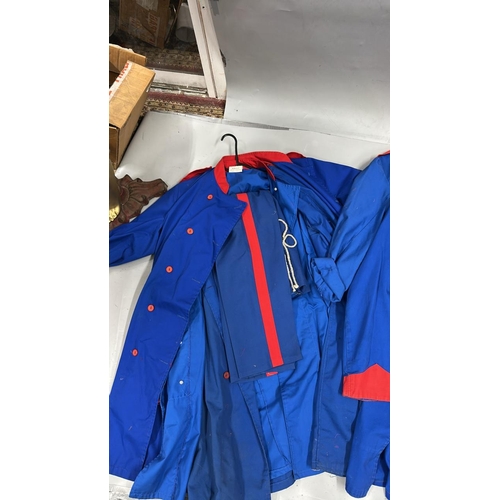 87 - A collection of 'stage worn' military style circus costume 3/4 length jackets, jackets, trousers and... 
