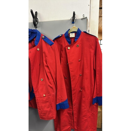 87 - A collection of 'stage worn' military style circus costume 3/4 length jackets, jackets, trousers and... 