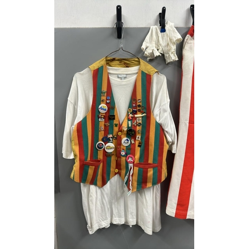 119 - Stage worn clown costume to include waistcoat with assorted pin badges, oversize shorts with braces,... 