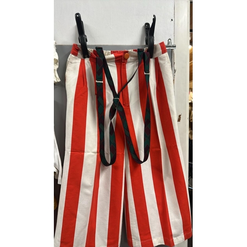 119 - Stage worn clown costume to include waistcoat with assorted pin badges, oversize shorts with braces,... 