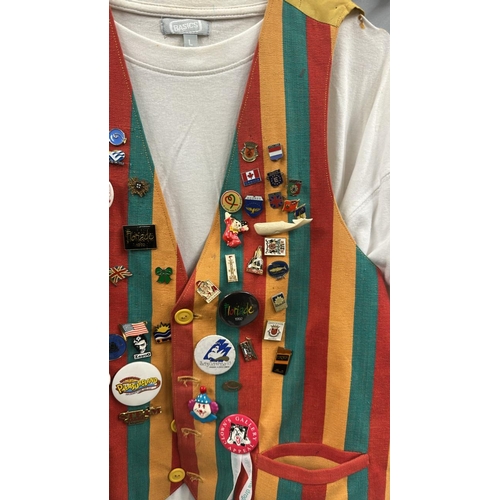119 - Stage worn clown costume to include waistcoat with assorted pin badges, oversize shorts with braces,... 