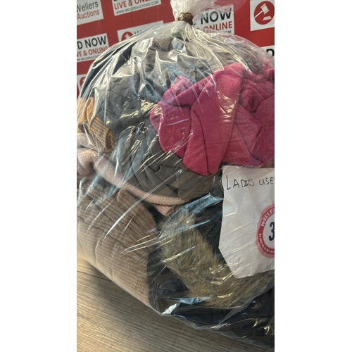 9133 - BAG OF LADIES USED CLOTHING / G68-G76