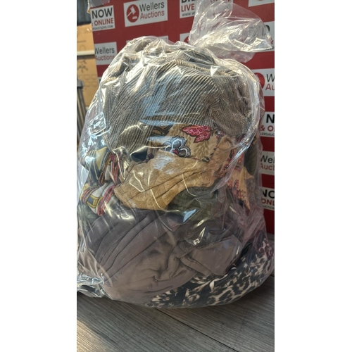 9143 - BAG OF LADIES USED CLOTHING / CW