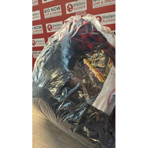 9143 - BAG OF LADIES USED CLOTHING / CW
