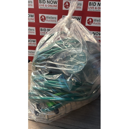 9178 - BAG OF GARDEN HOSES / CW