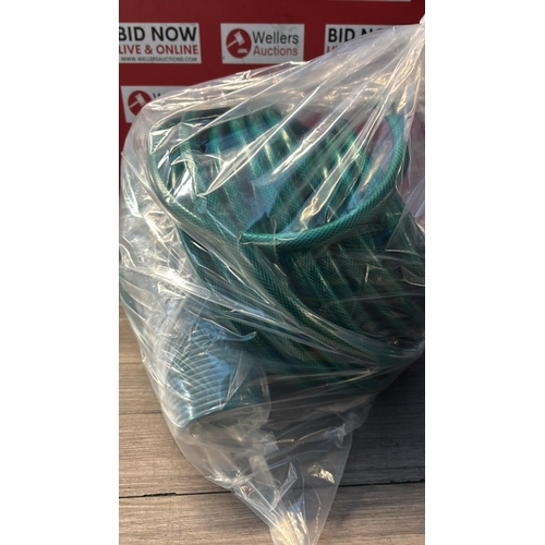 9178 - BAG OF GARDEN HOSES / CW