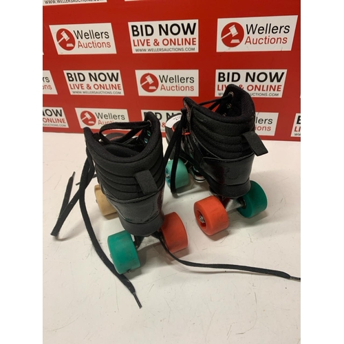 3207 - PAIR OF OXELO ROLLER SKATES