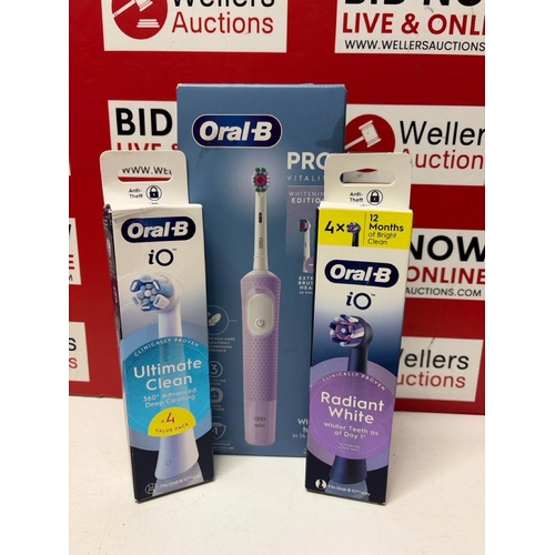 8230 - ORAL B PRO VITALITY ELECTRIC TOOTHBRUSH WITH SPARE HEADS