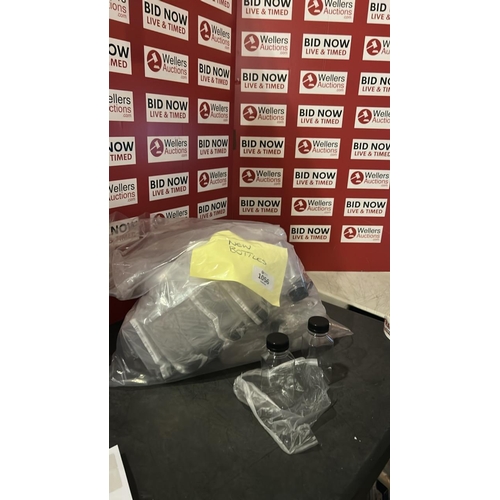 1056 - BAG OF BOTTLES NEW