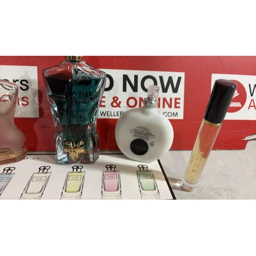 8054 - ASSORTED PERFUMES INC. JEAN PAUL GAULTIER, JIMMY CHOO AND MORE