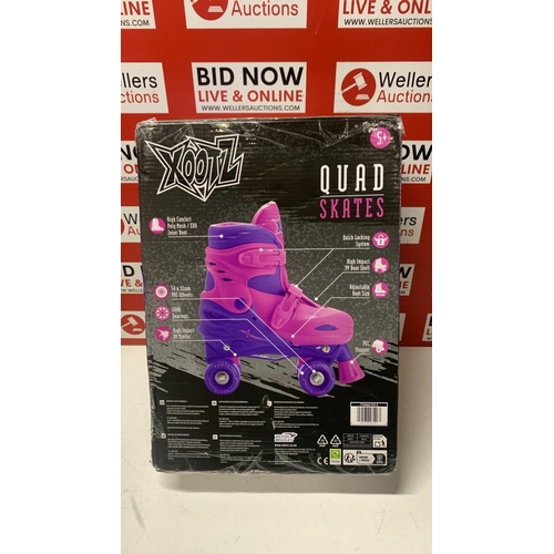 1018 - XOOTZ QUAD SKATES ADJUSTABLE SKATES 9-12