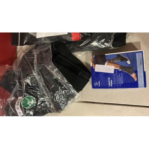 9004 - ASSORTED BACK AND SPORTS RELATED SUPPORTS