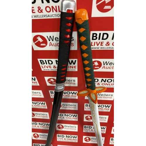 3294 - 2X FAUX SAMURAI SWORDS INC DEMON SLAYER SLIGHT DAMAGE