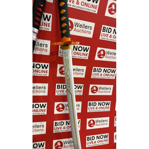 3294 - 2X FAUX SAMURAI SWORDS INC DEMON SLAYER SLIGHT DAMAGE
