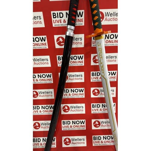 3294 - 2X FAUX SAMURAI SWORDS INC DEMON SLAYER SLIGHT DAMAGE