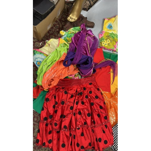 9002 - Selection of stage worn skirts, jackets, tops and dresses / AN113