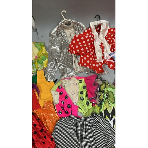 9002 - Selection of stage worn skirts, jackets, tops and dresses / AN113