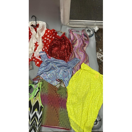 9002 - Selection of stage worn skirts, jackets, tops and dresses / AN113