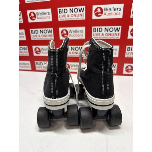 7299 - CHILDRENS PRE-OWNED ROOKIE ROLLERSKATES / SIZE 4