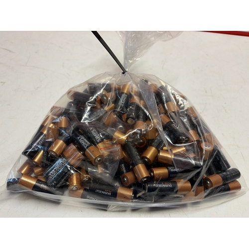 3153 - BAG OF NEW DURACELL AA BATTERIES