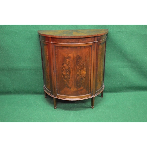 1 - Mahogany cross banded bow fronted side cabinet the door having oval mahogany panel opening to reveal... 