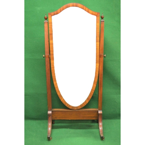 39 - Mahogany framed cheval mirror having shield shaped mirror supported on outward tapering uprights wit... 