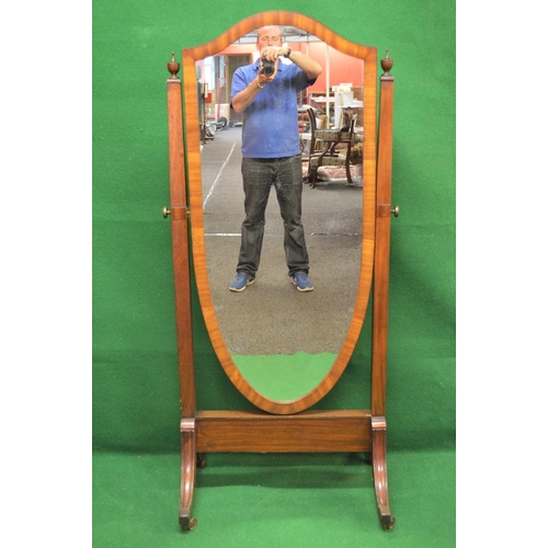 39 - Mahogany framed cheval mirror having shield shaped mirror supported on outward tapering uprights wit... 