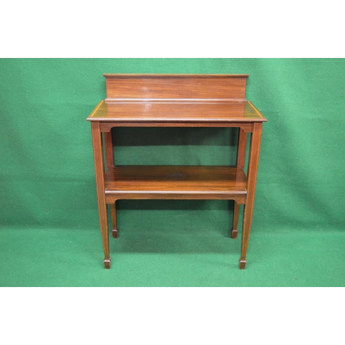 40 - Mahogany inlaid two tier buffet serving table the top having moulded edge and raised back supported ... 