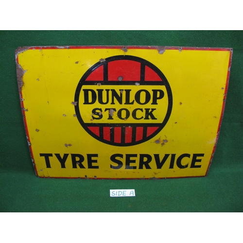 118 - Large enamel advertising sign Dunlop Stock Tyre Service, black letters on a yellow ground with red w... 