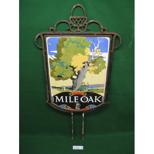 121 - Large double sided colourful enamel Mile Oak pub sign featuring a rambler enjoying a pint under an o... 