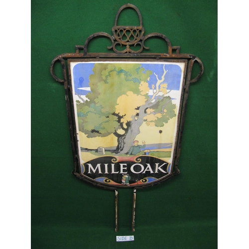 121 - Large double sided colourful enamel Mile Oak pub sign featuring a rambler enjoying a pint under an o... 